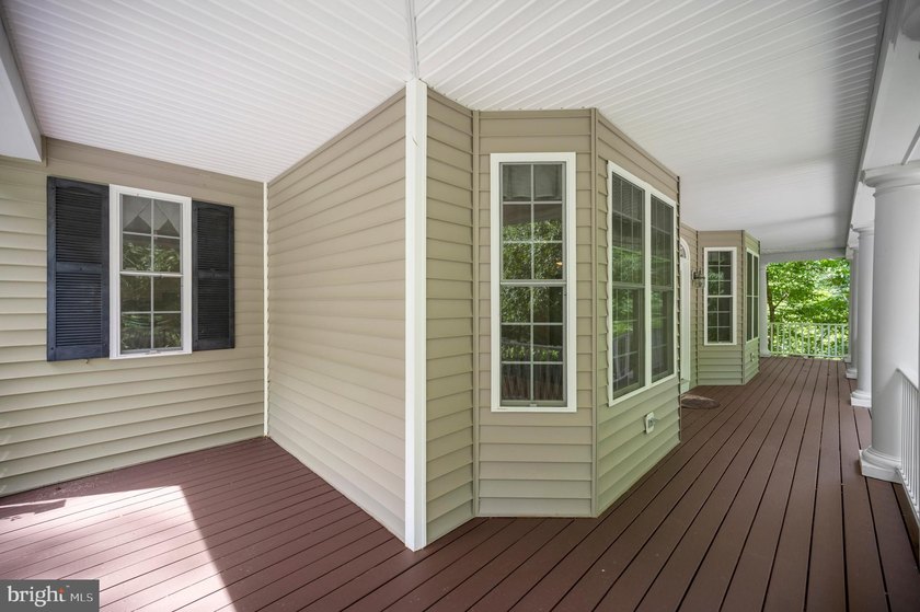 Imagine starting your day on the expansive covered front porch - photo 8