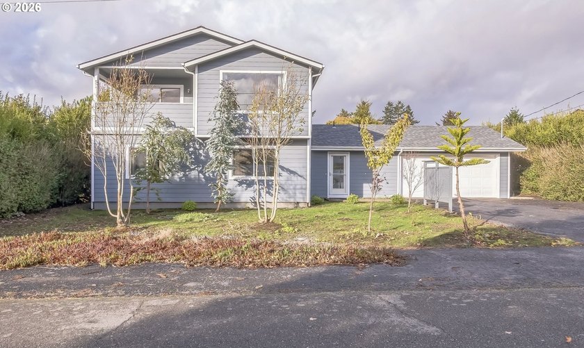 Renovated in 2018, this 3-bedroom, 2-bath home with Ocean views - photo 2