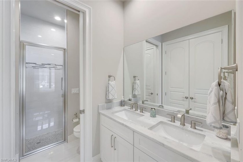 Sun, Sun, Sun! Sought after Southwest Exposure Luxury Waterfront - photo 27