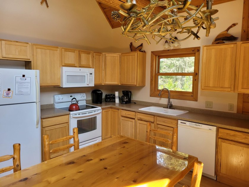 Pinestone Crossing sits on 26 shared wooded acres with over 700' - photo 6