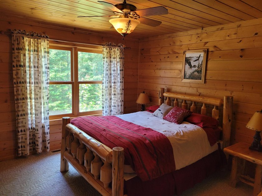 Pinestone Crossing sits on 26 shared wooded acres with over 700' - photo 7