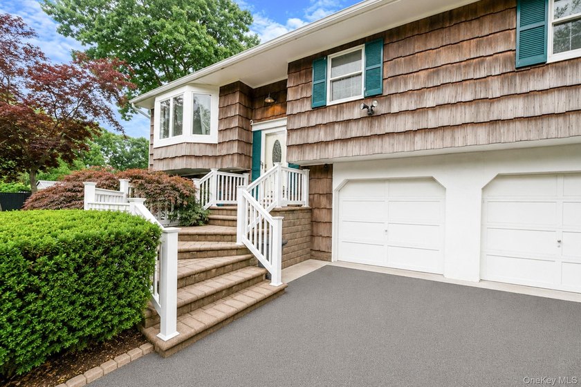 Welcome to this spacious 4-bedroom, 2-bath home in the heart of - photo 4