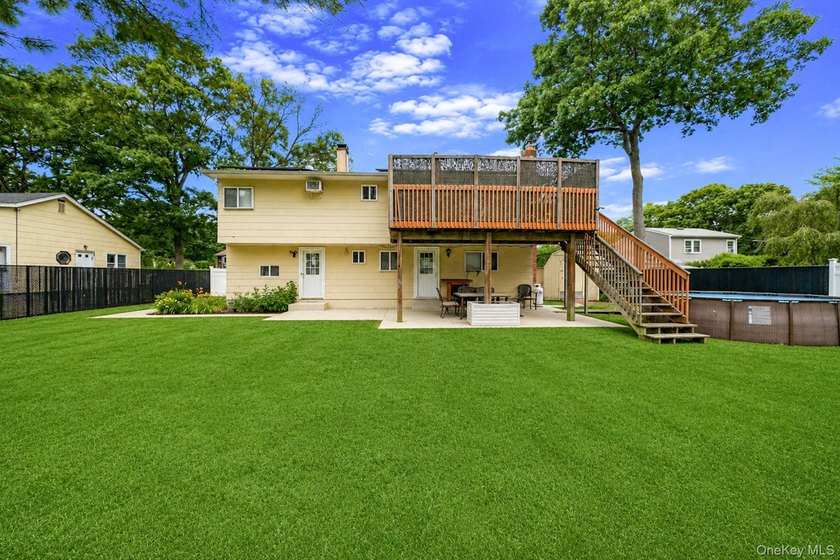 Welcome to this spacious 4-bedroom, 2-bath home in the heart of - photo 8