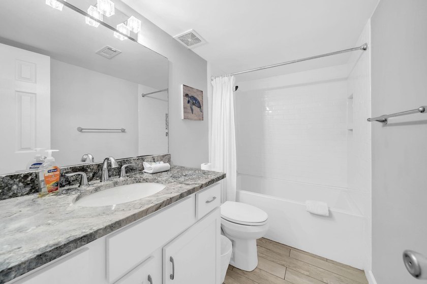 Show-stopper fully renovated ground floor golf villa is a - photo 19