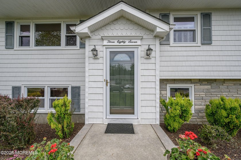 Home Sweet Home! Beautiful 3 Bed 2.5 Bath Expanded Bi-Level with - photo 2