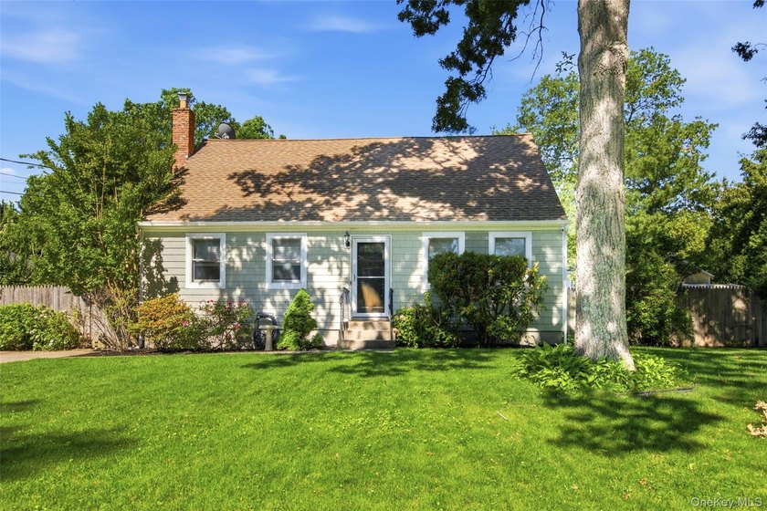 Welcome to this charming and well maintained 4 bedroom, 2 bath - photo 2