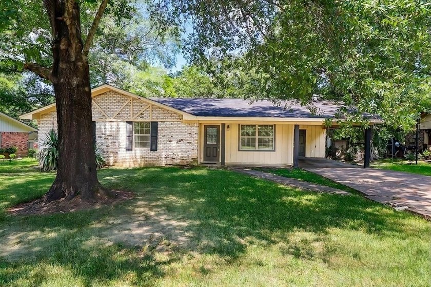 Full of charm, this inviting 3-bedroom, 2-bath home is proof - photo 2
