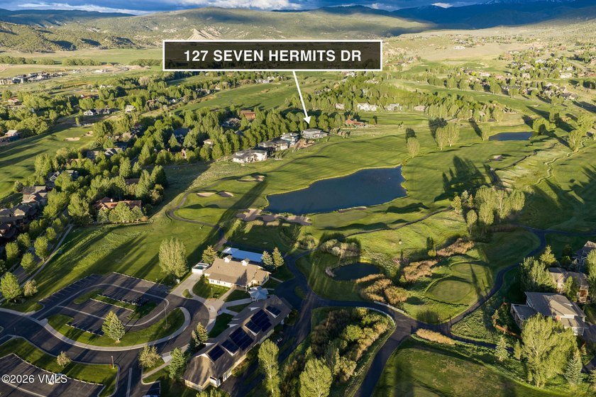 Welcome home to the coveted Eagle Ranch community, where - photo 2