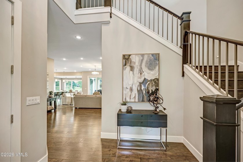 Welcome home to the coveted Eagle Ranch community, where - photo 3