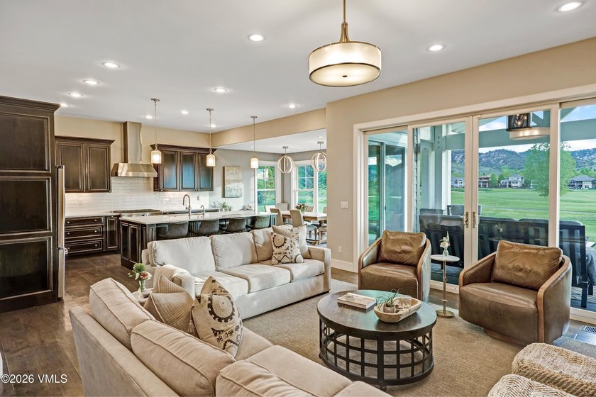 Welcome home to the coveted Eagle Ranch community, where - photo 5