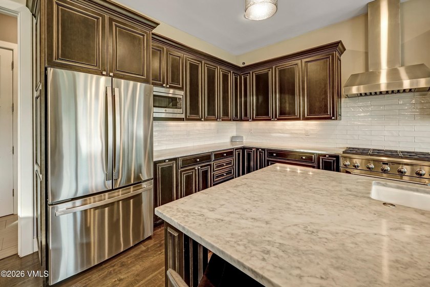 Welcome home to the coveted Eagle Ranch community, where - photo 10
