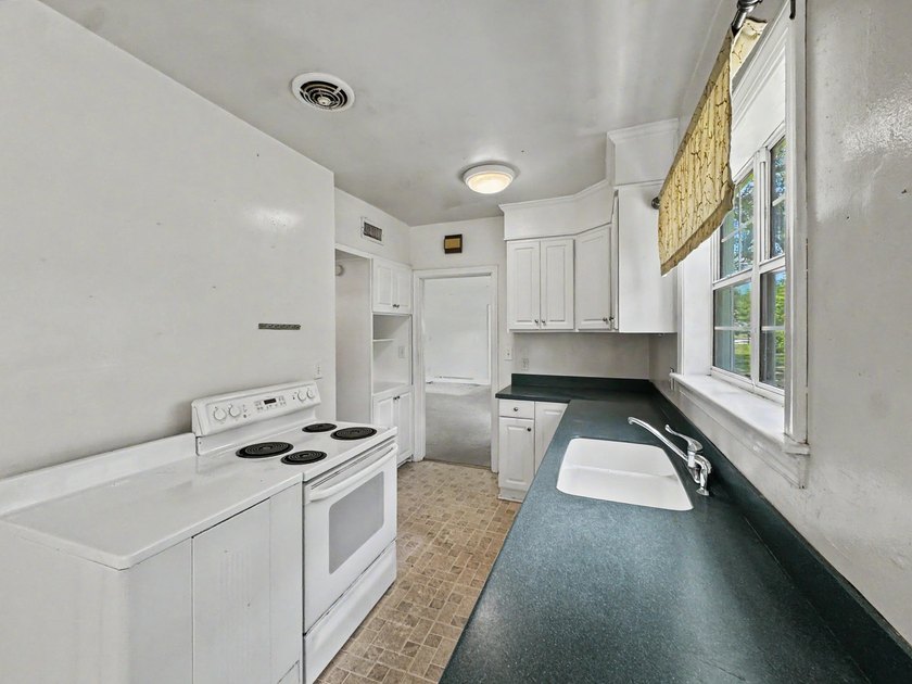 305 Geddes Avenue presents an excellent opportunity for - photo 5