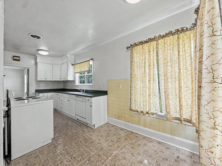 305 Geddes Avenue presents an excellent opportunity for - photo 6
