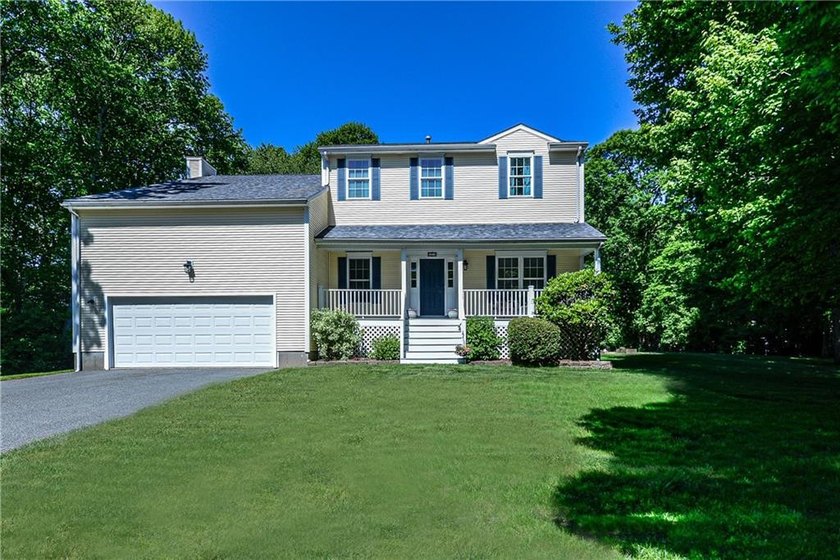 This charming 4-bedroom, 2 1/2-bath Colonial, is where comfort - photo 4