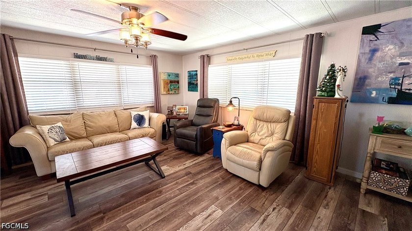 This SPACIOUS doublewide -- now available TURNKEY -- is IDEALLY - photo 3