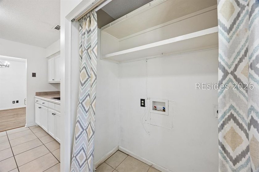 Tucked back on a quiet Lady's Island street, 16 Robin Way is a - photo 18
