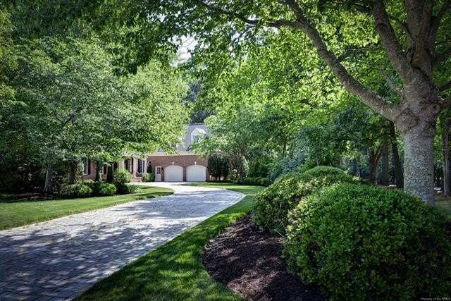 This all-brick colonial sits on a private end lot and offers a - photo 53