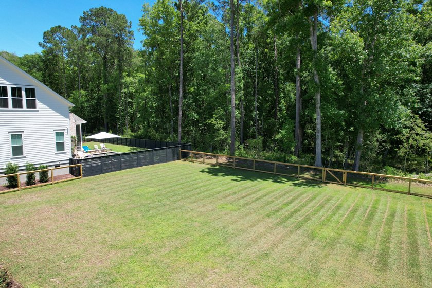 This Southern coastal chic family home is situated on a .4-acre - photo 2