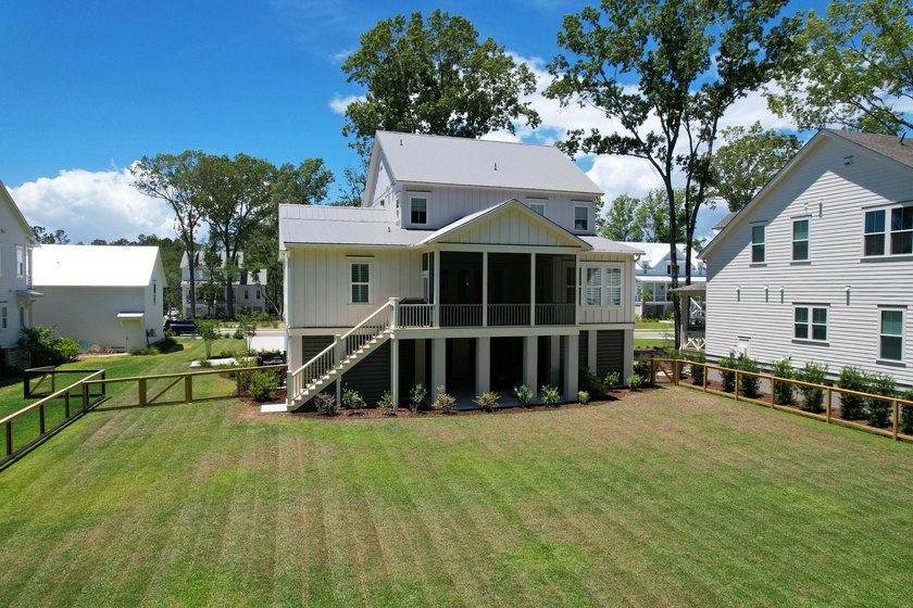 This Southern coastal chic family home is situated on a .4-acre - photo 4