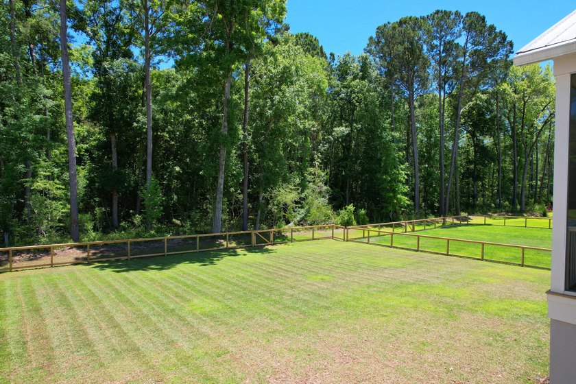 This Southern coastal chic family home is situated on a .4-acre - photo 6