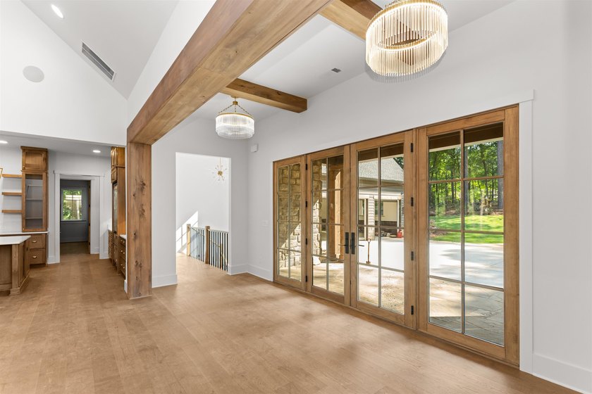 The Hearth is a waterfront home designed around the moments that - photo 11