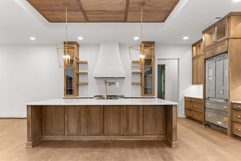 The Hearth is a waterfront home designed around the moments that - photo 12