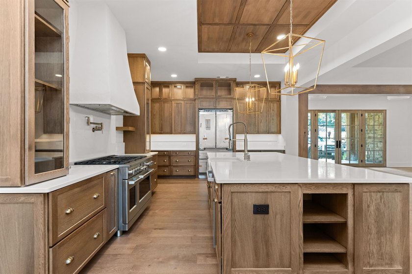 The Hearth is a waterfront home designed around the moments that - photo 14