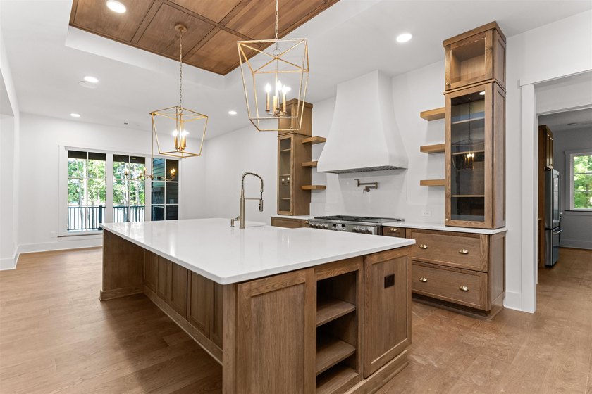The Hearth is a waterfront home designed around the moments that - photo 16