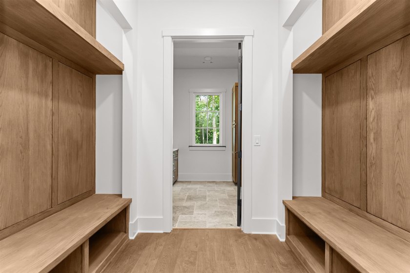 The Hearth is a waterfront home designed around the moments that - photo 17