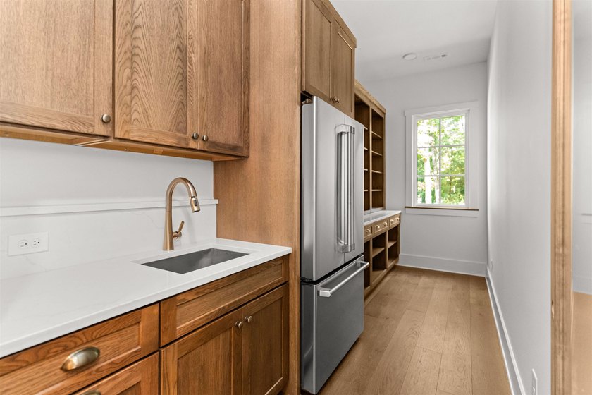 The Hearth is a waterfront home designed around the moments that - photo 22