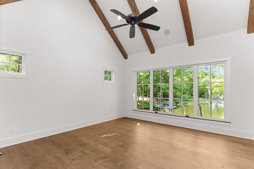 The Hearth is a waterfront home designed around the moments that - photo 23