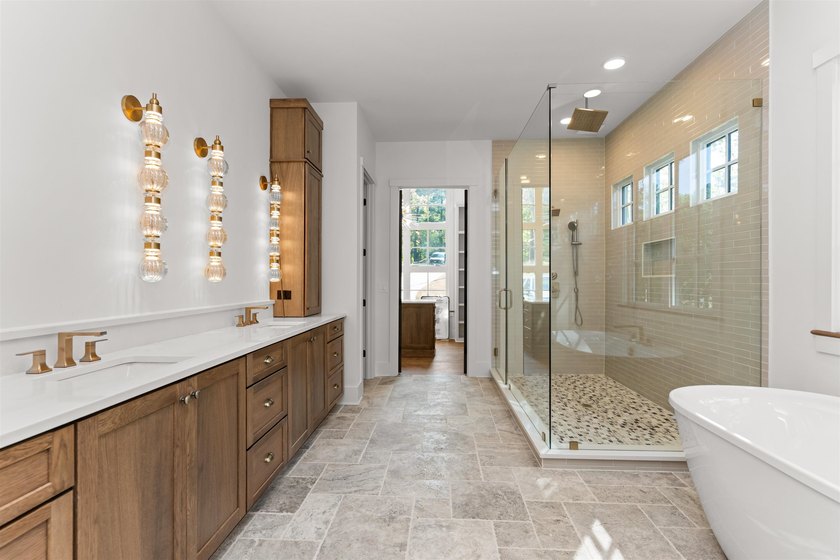 The Hearth is a waterfront home designed around the moments that - photo 24