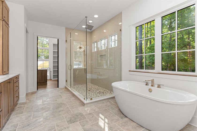 The Hearth is a waterfront home designed around the moments that - photo 25