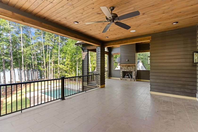 The Hearth is a waterfront home designed around the moments that - photo 27