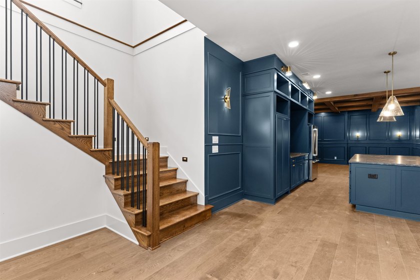 The Hearth is a waterfront home designed around the moments that - photo 31