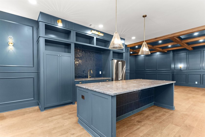 The Hearth is a waterfront home designed around the moments that - photo 32