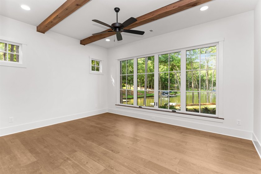 The Hearth is a waterfront home designed around the moments that - photo 35