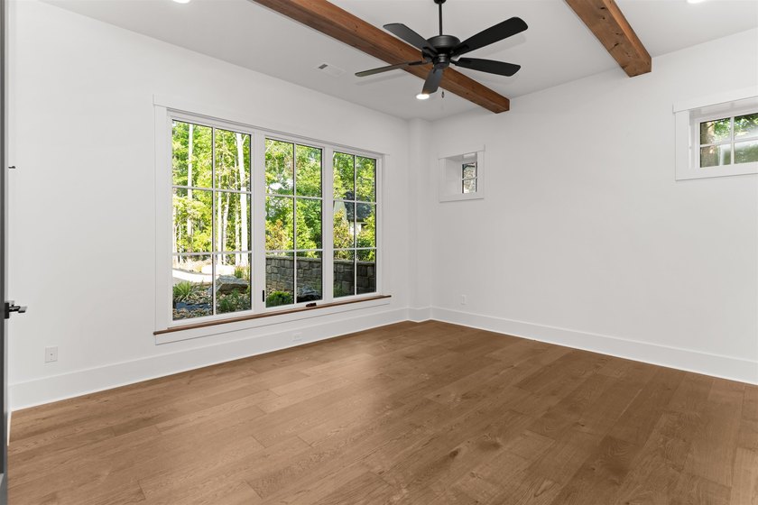 The Hearth is a waterfront home designed around the moments that - photo 42