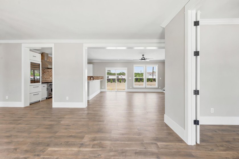 Welcome to 670 Kent Road, where a beautiful gated brick entrance - photo 6