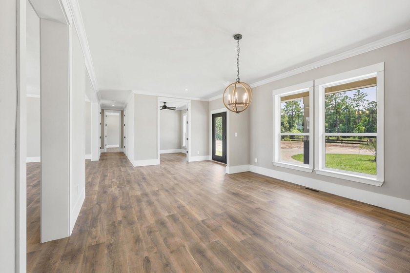 Welcome to 670 Kent Road, where a beautiful gated brick entrance - photo 9