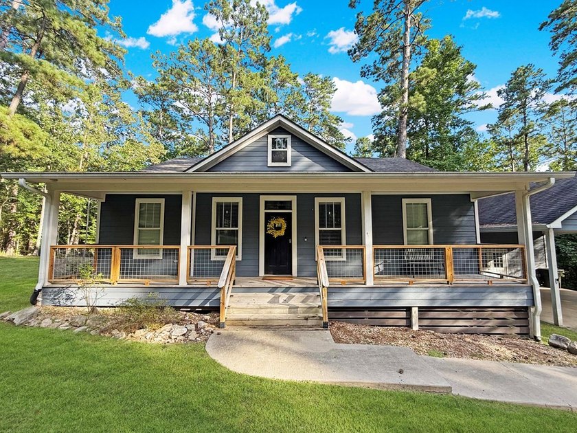Enjoy the Rayburn Country lifestyle in this beautiful partially - photo 4