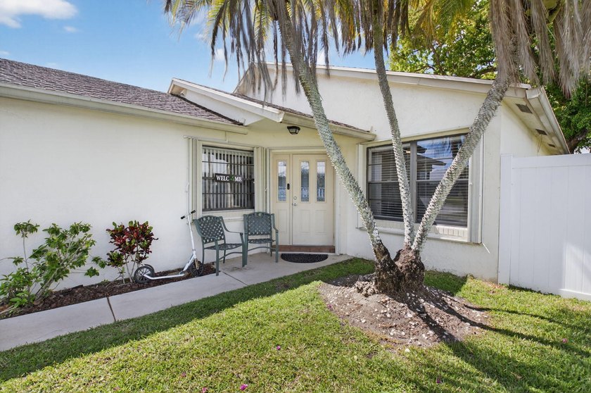 This beautifully renovated 3-bedroom, 2-bath home is tucked away - photo 4
