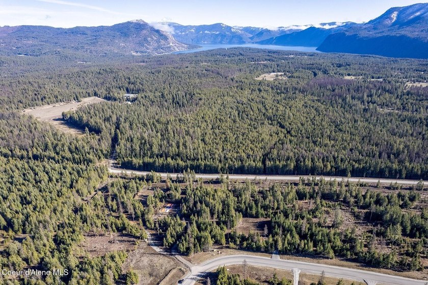 TO BE BUILT: Set on five private, lightly wooded acres in The - photo 20