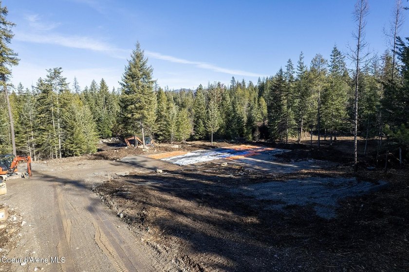 TO BE BUILT: Set on five private, lightly wooded acres in The - photo 22