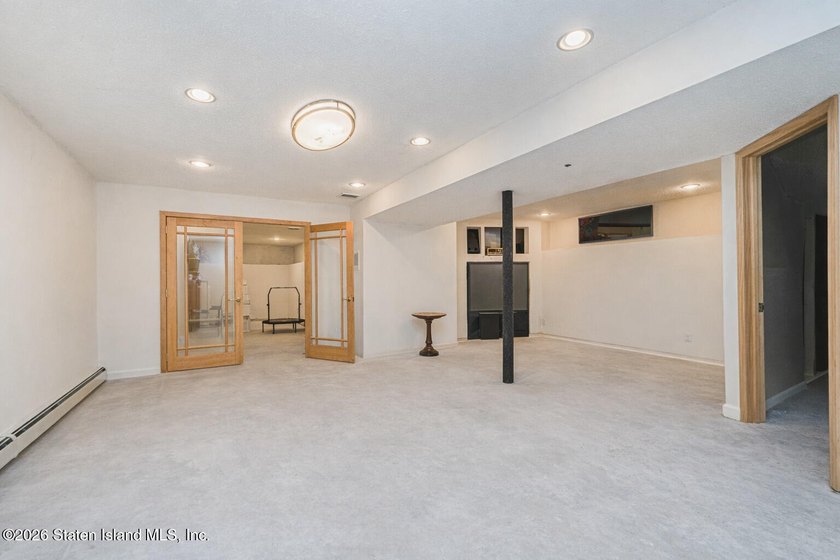 This Stunning 2-Family Contemporary Home Nestled in the - photo 29