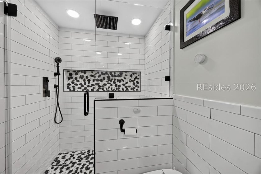 Located in the desirable Windward Village enclave within the - photo 17