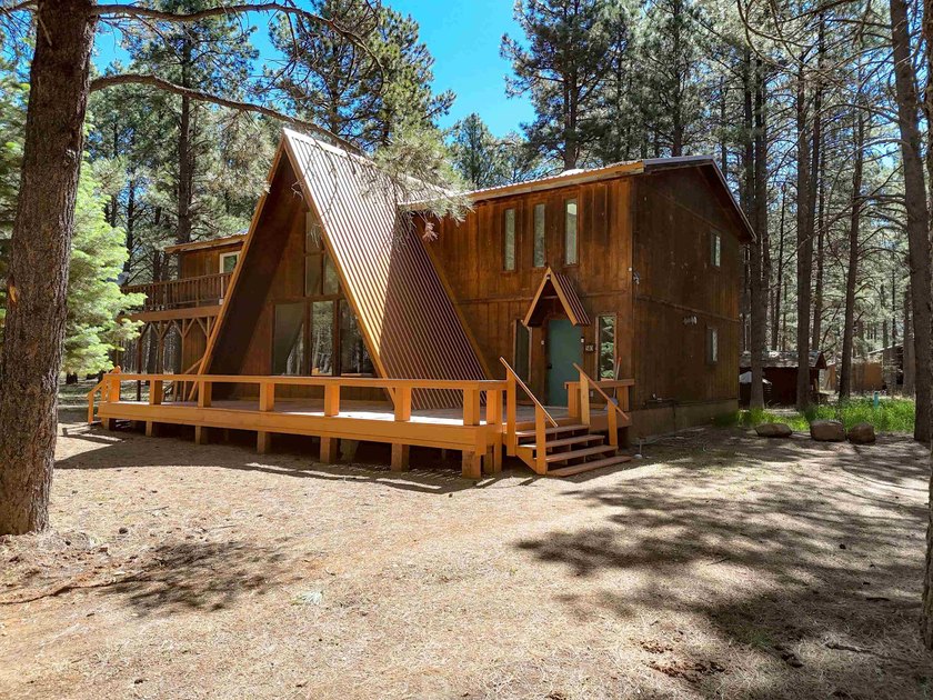 Welcome to 50 Knollwood Way, a quintessential A-frame chalet - photo 3