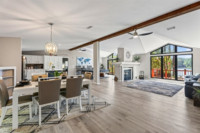 Discover the beauty of waterfront living on Lake Pinkston in - photo 4