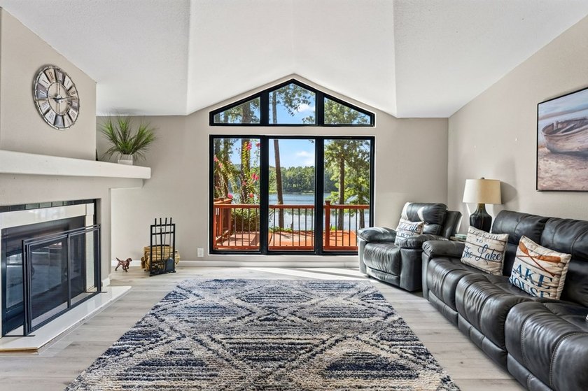 Discover the beauty of waterfront living on Lake Pinkston in - photo 6