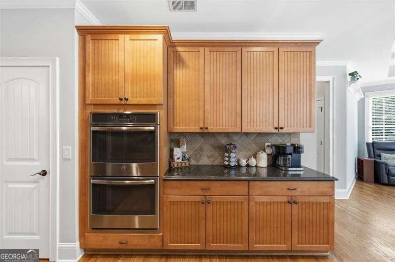 Minutes from Lake Allatoona, tucked on 3.42 private acres, this - photo 12
